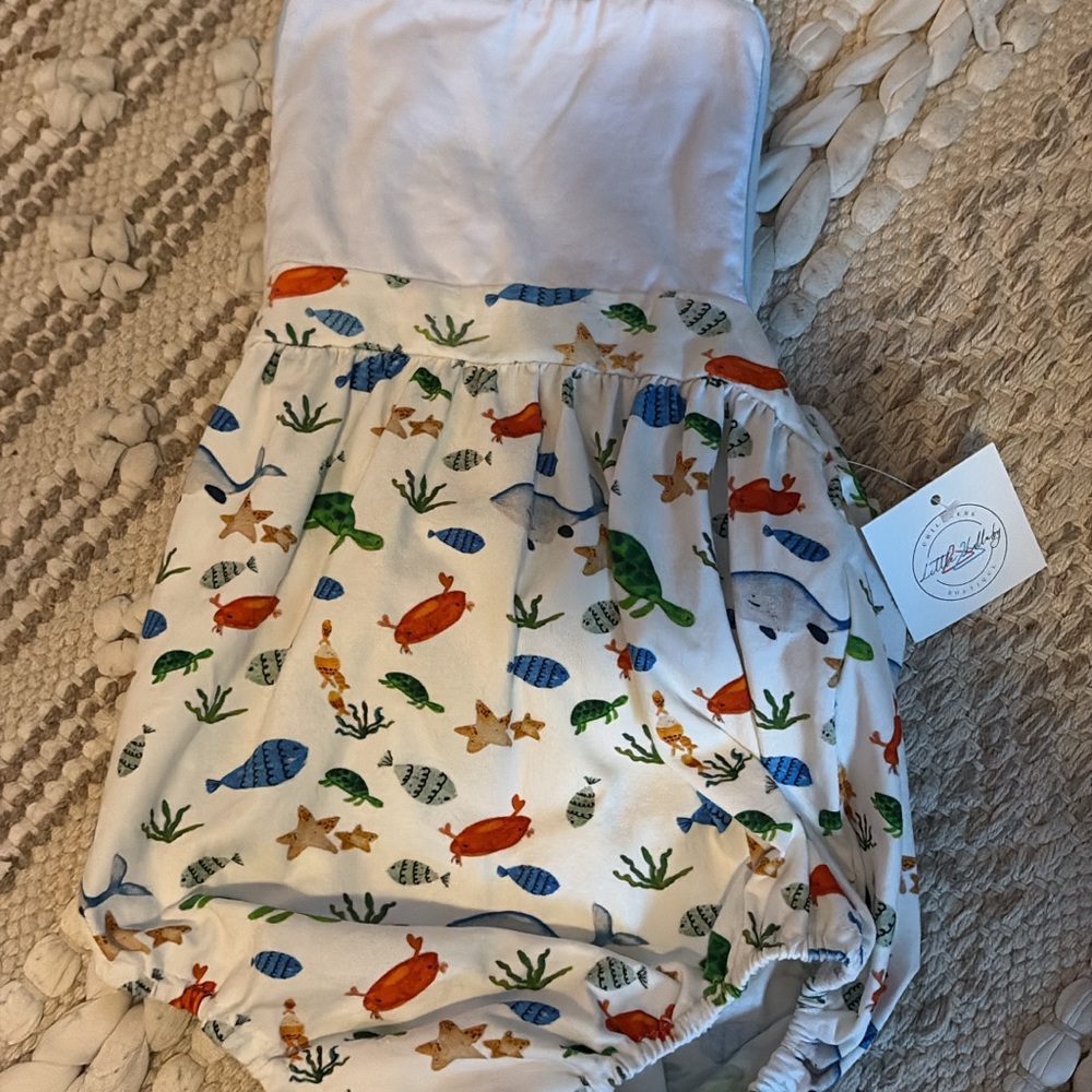 White and Blue Bodysuit with Playful Design